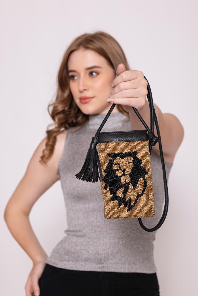 ECO-CONSCIOUS ELISA BLACK/GOLD SLING BAG ABELARDO DE MODA